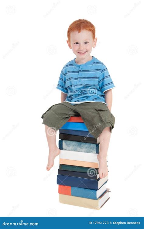 Boy Sitting On Stack Of Books Stock Image Image Of Smiling