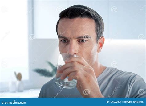 Calm Man Drinking Water While Being Thirsty Stock Image Image Of