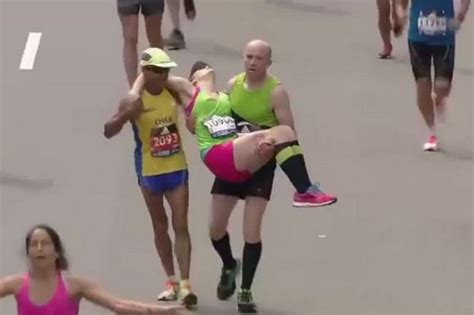 watch touching moment irish hero helps collapsed runner over finish line of boston marathon