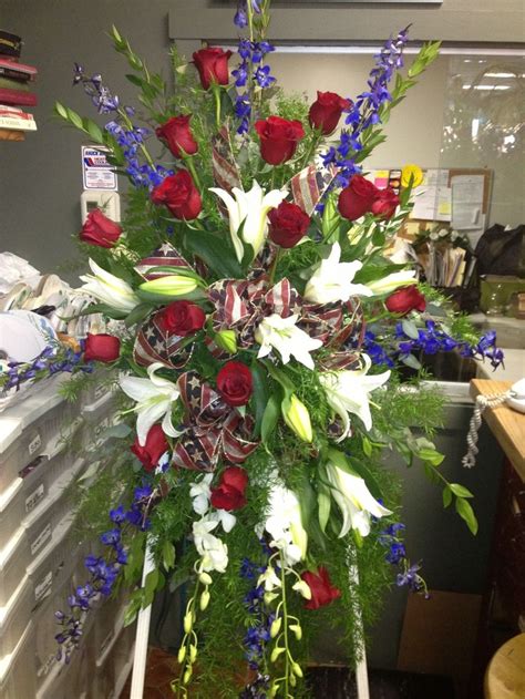 Now in its third season we are focusing on good movies and also whatever people want to pay us to watch. Red white and blue standing spray | Flower arrangement ...