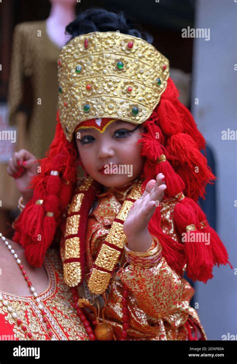 A Girl Dressed Up As Living Goddess Kumari Attends Kumari Puja
