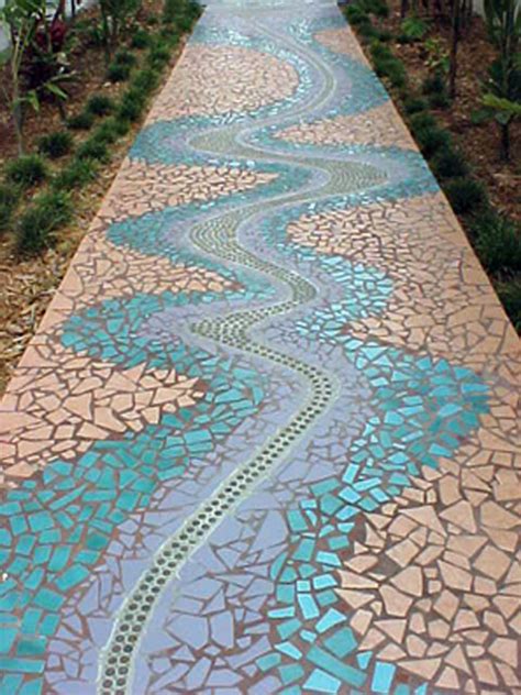 The sand will hold the stones in place as you work. Mosaic-web