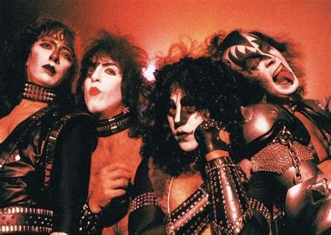 The Kiss Band Posing For A Photo In Their Costumes