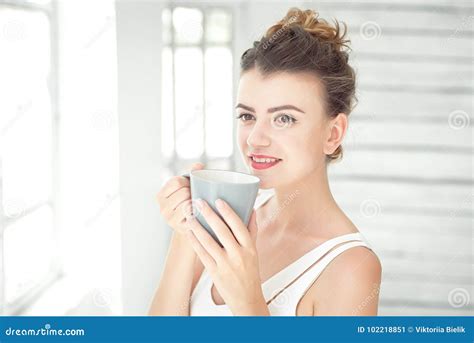 Pretty Young Woman Holding A Cup Of Coffee Stock Image Image Of Girl
