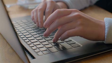 woman typing on laptop keyboard in office stock footage sbv 334813753 storyblocks