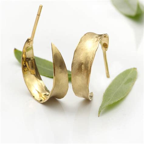 Maybe you would like to learn more about one of these? Leaf Hoop Earrings In 18ct Gold By Lilia Nash Jewellery | notonthehighstreet.com