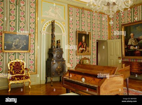 Rococo Room Containing A Harpsichord And A Wood Burning Stove In The