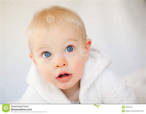 A Beautiful Baby Boy With Big Blue Eyes Stock Photos