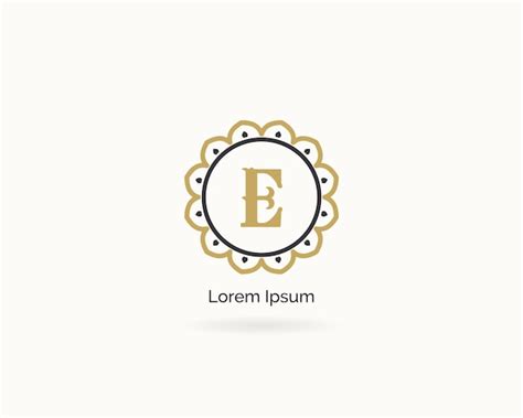 Premium Vector A Gold And White Logo With The Letter E
