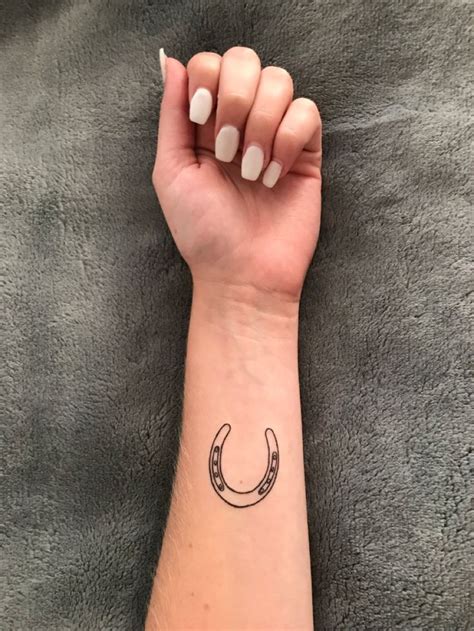 Horseshoe Tattoo In 2022 Horse Shoe Tattoo Cowgirl Tattoos Dainty