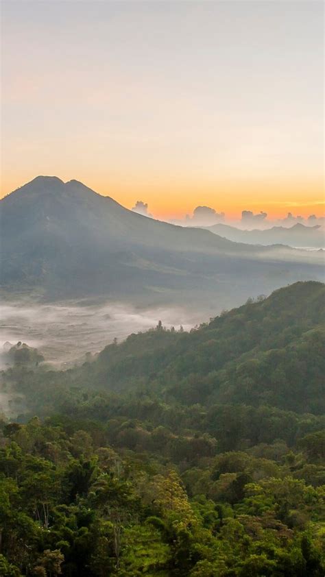 Hilltops Over Morning Fog In Remote Landscape Kintamani Bali