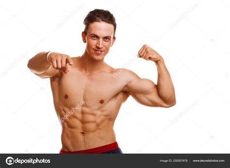 Handsome Young Ripped Bodybuilder Flexing His Muscles Smiling