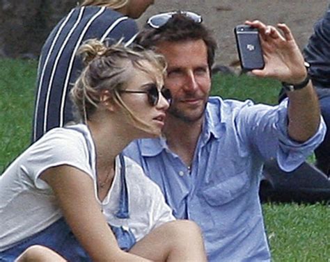 Bradley Cooper And Suki Waterhouse In A Park In Parislainey Gossip