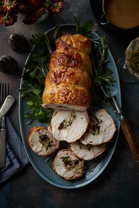 Roasted Turkey Breast Roulade With Cranberry Herb Stuffing Olive Mango