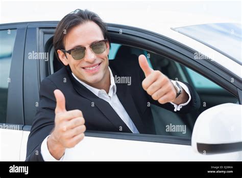 Happy Driving Businessman With Thumbs Up Stock Photo Alamy