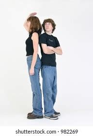 Two People Seeing Who Taller Than Foto Stock 982269 Shutterstock
