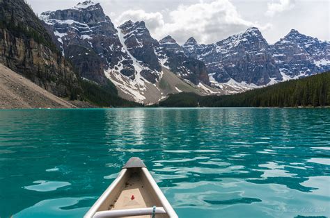 Canoeing On Moraine Lake Alberta Canadaby Janette Asche