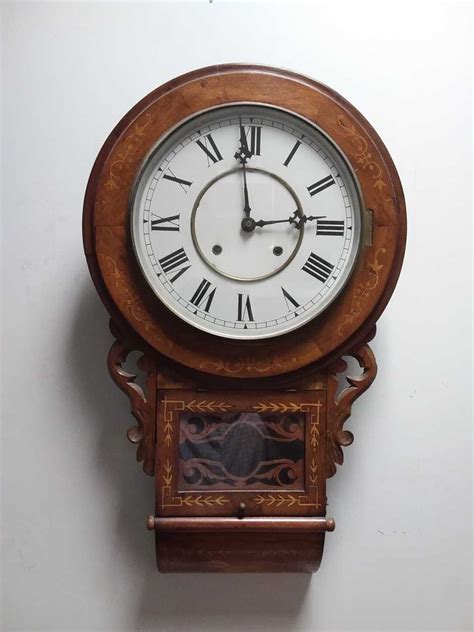 A Late Victorian American Walnut Case Drop Dial Wall Clock In