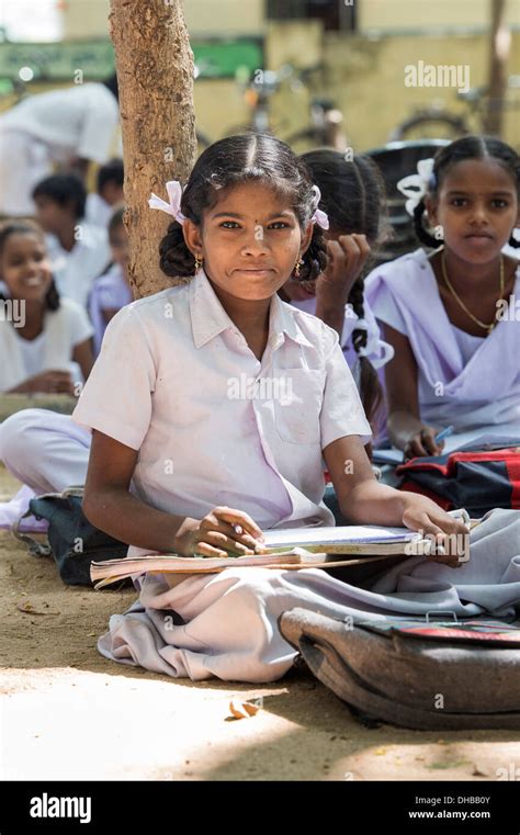 Rural Indian Village High School Girls Writing In Books In An Outside Class Andhra Pradesh