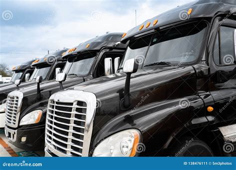 Fleet Of Black 18 Wheeler Semi Trucks Stock Image Image Of Fleet