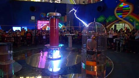In singapore, it's just another unwelcome car. Tesla Coil Show at Singapore Science Centre - Demo #3 ...