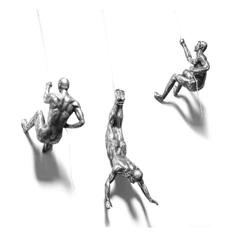 This is a 3 pc set of the climbing man wall art home decor in black / choco color new design. Climbing Men Accent Wall Decor Sculpture