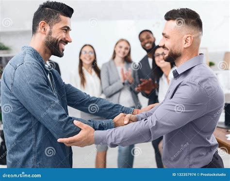 Two Men Shaking Hands At Business Meeting Stock Photo Image Of