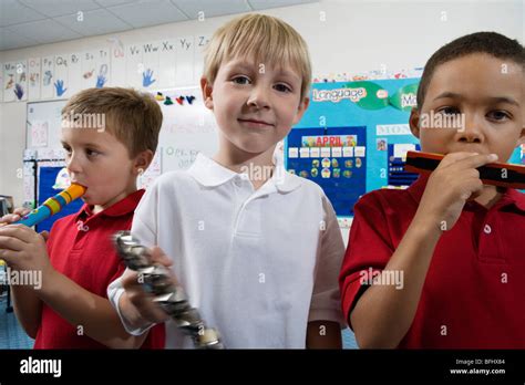 Elementary Students In Music Class Stock Photo Alamy