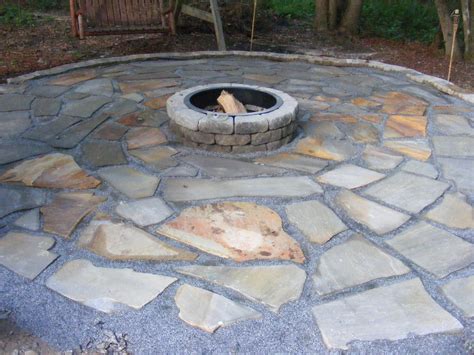 For patios which will only be used as walkways, a 1 inch of pea gravel is enough. Make a Flagstone Patio
