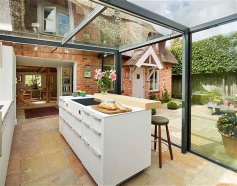 High quality & easy to set up. Glass Box Kitchen Extension for a Thatched Cottage in ...