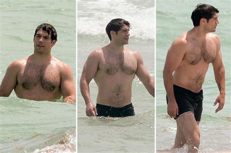 Superman Hunk Henry Cavill Shows Off His Super Beach Bod As He Emerges