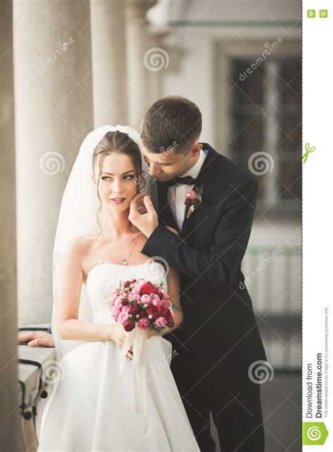 Lovely Happy Wedding Couple Bride With Long White Dress