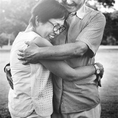 Free Photo Senior Asian Couple Hugging Each Other