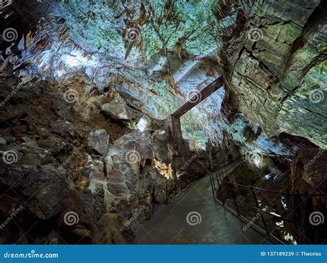 View Of Stalactites And Stalagmites In An Underground Cavern Postojna