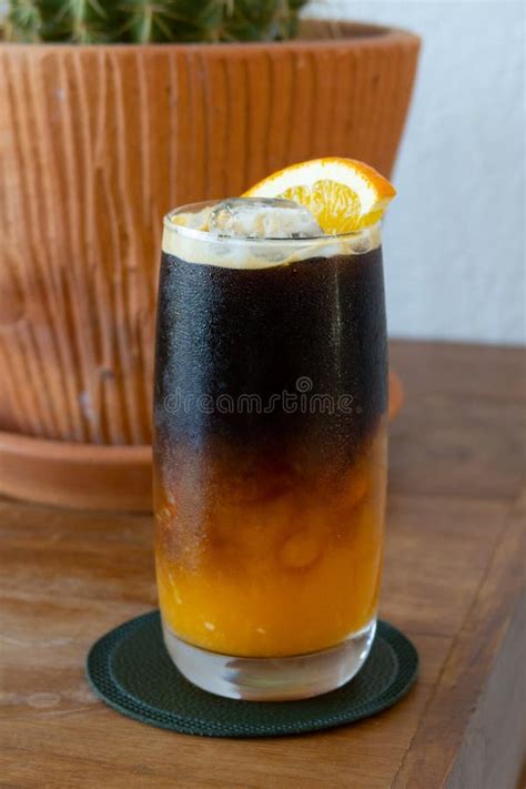 Photo Of Ice Coffee Americano With Orange Juice Stock Image Image Of