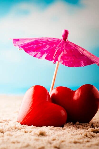 Premium Photo Two Hearts On The Beach Honeymoon On Summer