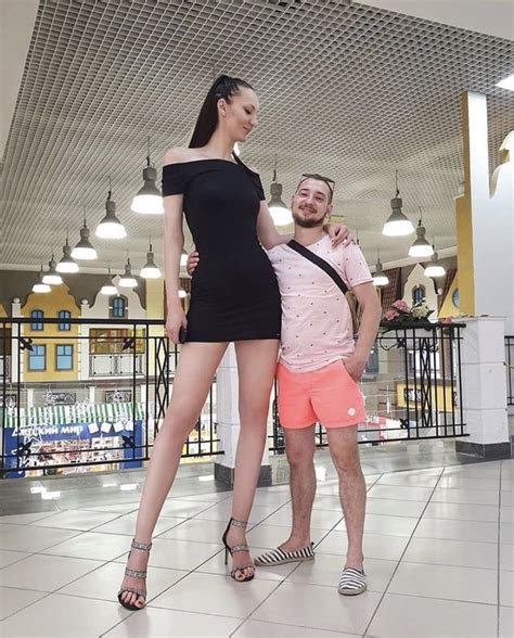 Ekaterina Lisina From Russia Next To An Average Male Tall Women
