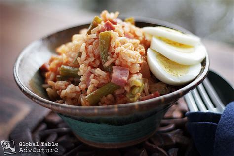The rice steam on low heat for 10 minutes. Smoked Ham & Green Bean | Jollof | Global Table Adventure