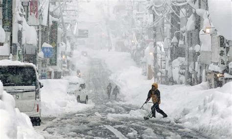 Japanese Cities Blanketed In Record Levels Of Snowfall Japan The