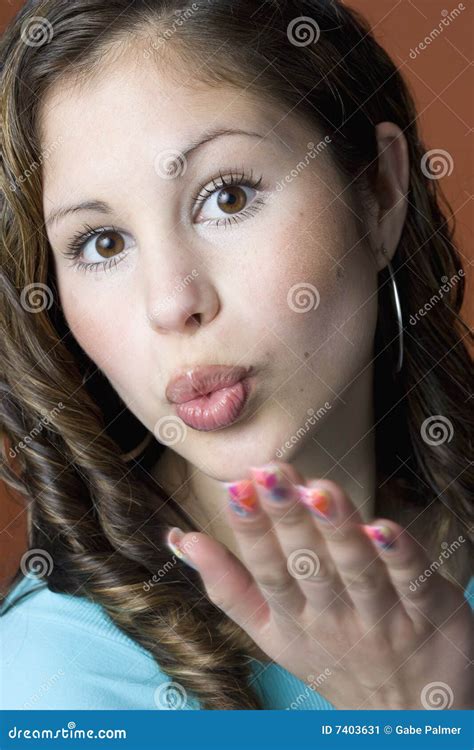 Young Woman Blowing A Kiss Stock Image Image Of Female 7403631