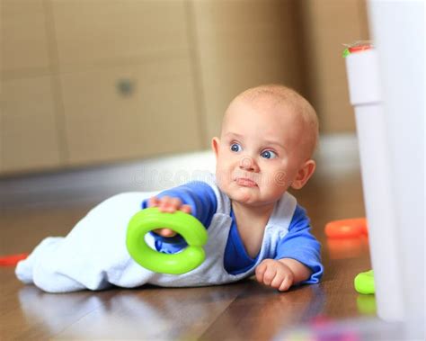 Angry Baby Boy Learning To Crawl Annoyed Stock Image Image Of Grass