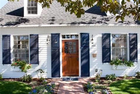 Navy Blue Shutters With Anchor Cutouts Pletely Coastal