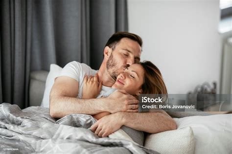 Young Loving Couple In Bed Stock Photo Download Image Now 30 34
