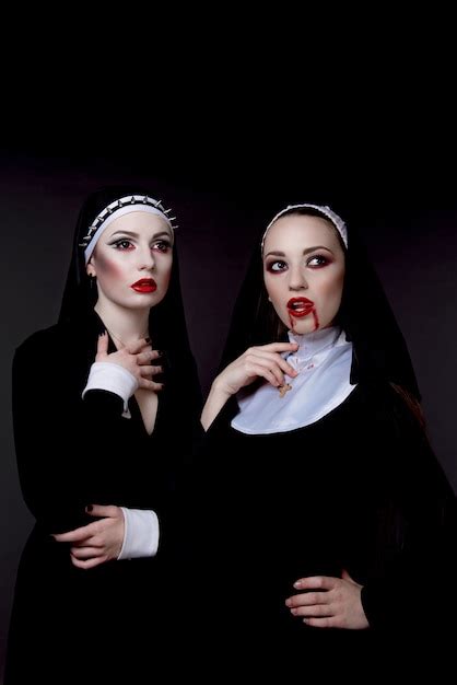 Premium Photo Women Dressed In An Evil Sexy Nuns