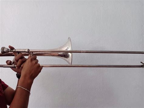 Men Practice Trombone Playing As A Song In Order To Play With Large