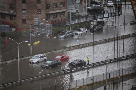 Photos Heavy Rains Bring Flash Floods To New York City Roads And