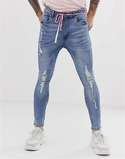 Night Addict Ripped Skinny Jeans With Waist Rope Asos