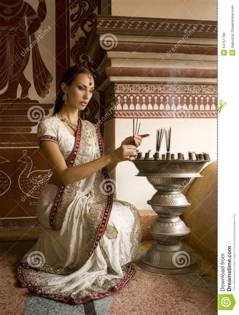 Beautiful Young Indian Woman In Traditional Clothing With Incense