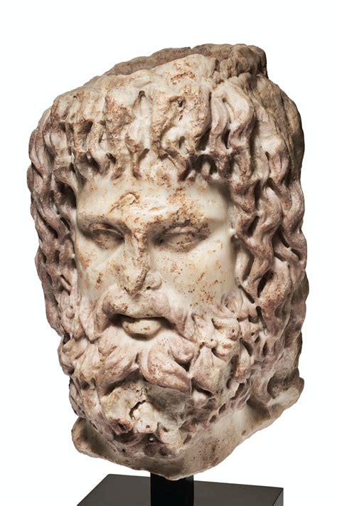 A Roman Marble Head Of Serapis