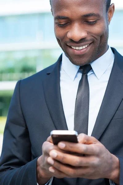 African Man Holding Mobile Phone Stock Image Everypixel
